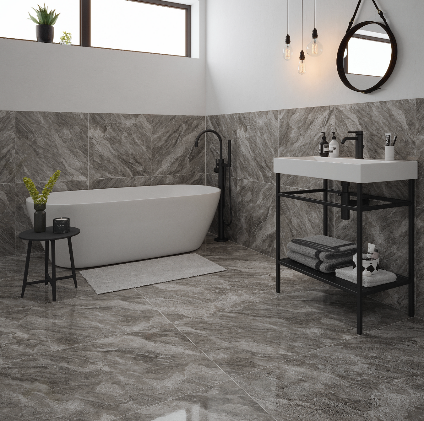 Modern bathroom with freestanding bathtub, sink, and decorative elements.