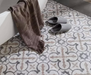Porcelanosa Barcelona C L 59.6x59.6cm shown in a styled room setting