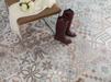 Porcelanosa Barcelona D L 59.6x59.6cm shown in a styled room setting