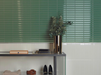 Porcelanosa Blinds Jade 16.15x30x1.15 15x30cm shown in a styled room setting