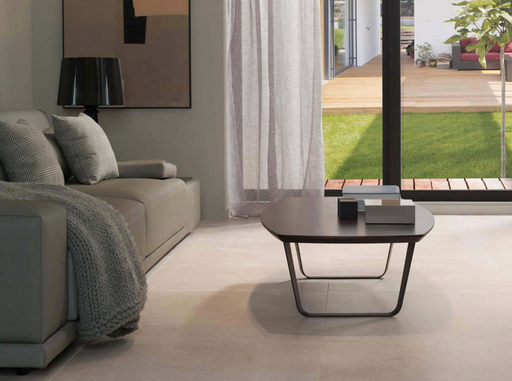 Porcelanosa Bottega Caliza L 120x120cm shown in a styled room setting