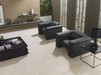 Porcelanosa Bottega Caliza L 59.6x59.6cm shown in a styled room setting