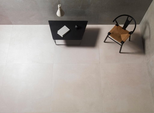 Porcelanosa Bottega Topo L 120x120cm shown in a styled room setting