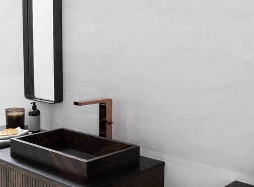 Porcelanosa Butan Bone 45x120cm shown in a styled room setting