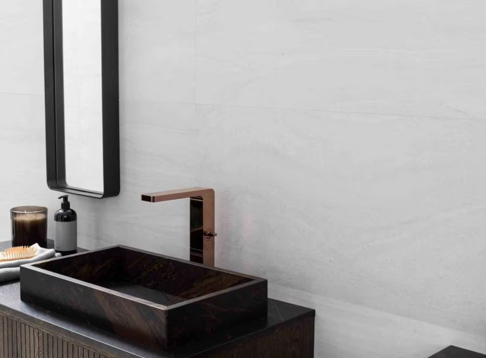 Porcelanosa Butan Bone 45x120cm shown in a styled room setting