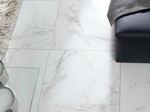 Porcelanosa Carrara Blanco Natural L 59.6x59.6cm shown in a styled room setting