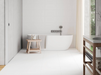 Porcelanosa China Blanco L 33.299999999999997x59.2cm shown in a styled room setting