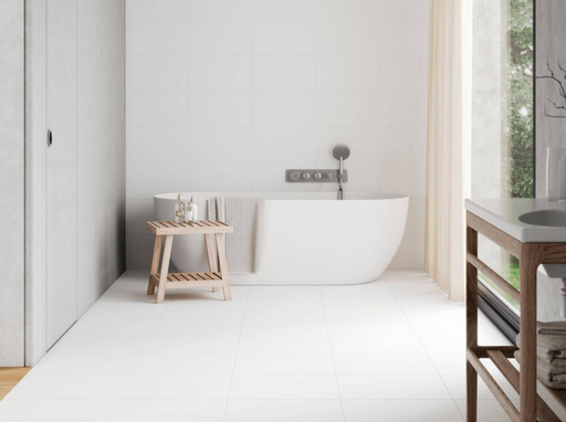 Porcelanosa China Blanco L 33.299999999999997x59.2cm shown in a styled room setting