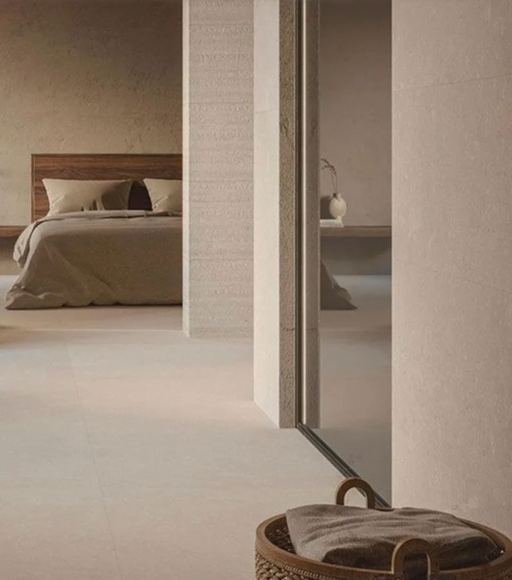 Porcelanosa Coral Caliza L 25x44.3cm shown in a styled room setting