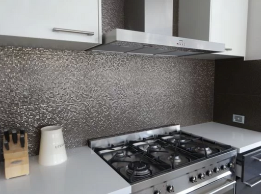 Porcelanosa Cubica Gris L 25x44.3cm shown in a styled room setting