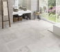 Porcelanosa Deco Harlem Caliza L 59.6x59.6cm shown in a styled room setting