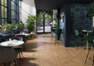 Porcelanosa Deco Vetri Blu 33.299999999999997x59.2cm shown in a styled room setting