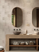 Porcelanosa Dorcia Bone C-2(r10) L 120x120cm shown in a styled room setting