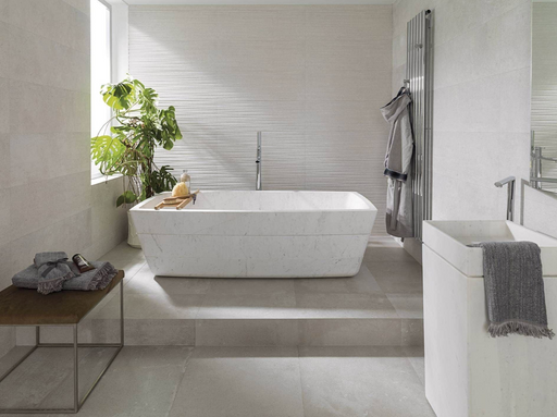 Porcelanosa Dover Caliza L 59.6x59.6cm shown in a styled room setting