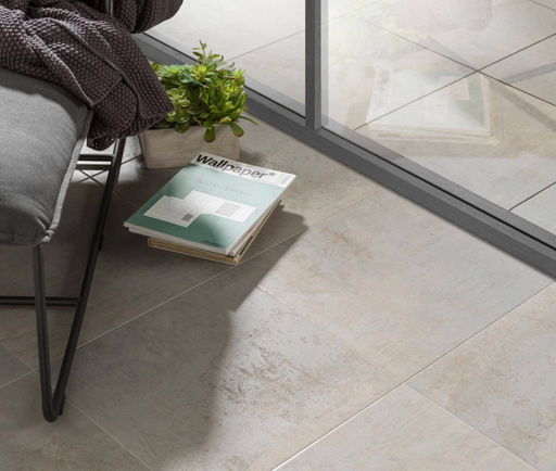 Porcelanosa Ferroker Aluminio L 44.3x44.3cm shown in a styled room setting