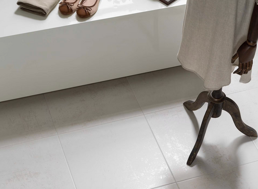 Porcelanosa Ferroker Niquel L 44.3x44.3cm shown in a styled room setting