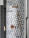 Porcelanosa Figure Spiral Light 29.9x29.9x1 25.8x29.9cm shown in a styled room setting