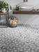 Porcelanosa Figure Spiral Light 29.9x29.9x1 25.8x29.9cm shown in a styled room setting
