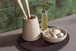 Porcelanosa Fiji Green 10x20x0.85 10x20cm shown in a styled room setting