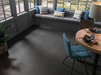 Porcelanosa Karachi Grey L 120x120cm shown in a styled room setting