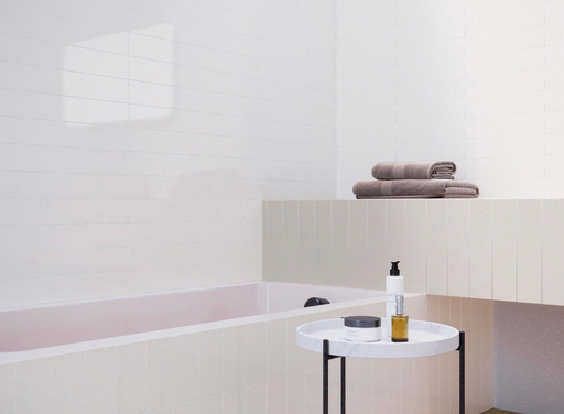 Porcelanosa Kent Cream Gloss 8x30x0.85 8x30cm shown in a styled room setting