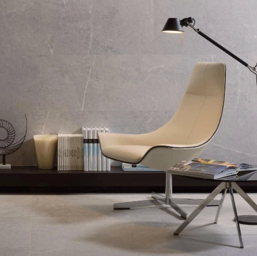 Porcelanosa Lucerna Acero Ant.l 120x120cm shown in a styled room setting