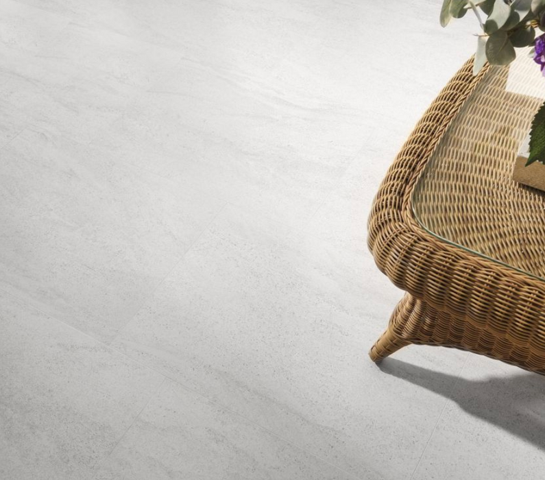 Porcelanosa Madagascar Blanco L 44.3x44.3cm shown in a styled room setting