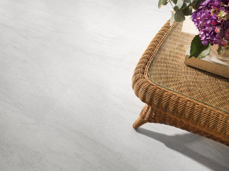 Porcelanosa Madagascar Blanco L 59.6x59.6cm shown in a styled room setting