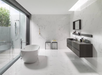 Porcelanosa Marmol Carrara Blanco 45x120cm shown in a styled room setting