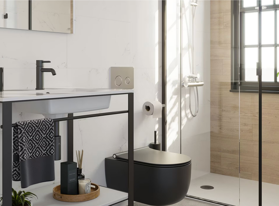 Porcelanosa Marmol Carrara Blanco L 33.299999999999997x59.2cm shown in a styled room setting