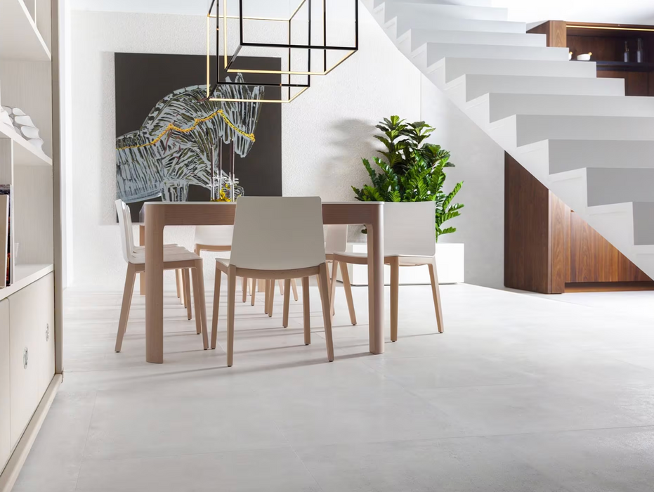 Porcelanosa Metropolitan Caliza L 59.6x59.6cm shown in a styled room setting
