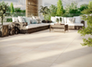 Porcelanosa Newport Natural L 59.6x59.6cm shown in a styled room setting