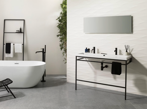 Porcelanosa Noir Caliza L 120x120cm shown in a styled room setting