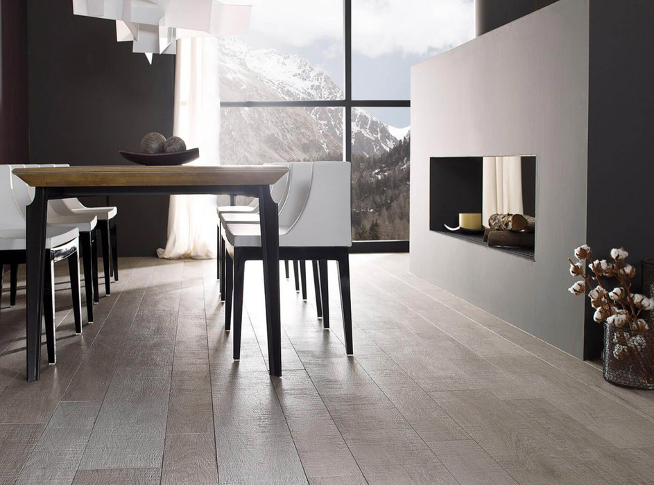 Porcelanosa Oxford Acero 19.3x120cm shown in a styled room setting