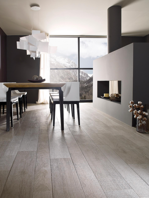 Porcelanosa Oxford Acero 29.4x120cm shown in a styled room setting