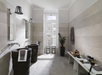 Porcelanosa Park Acero L 59.6x59.6cm shown in a styled room setting