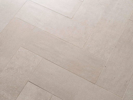Porcelanosa Parma Limestone 14.2x44x0.85 14.2x44cm shown in a styled room setting