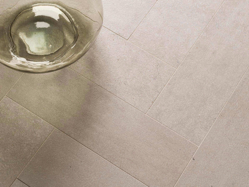 Porcelanosa Parma Limestone 14.2x44x0.85 14.2x44cm shown in a styled room setting