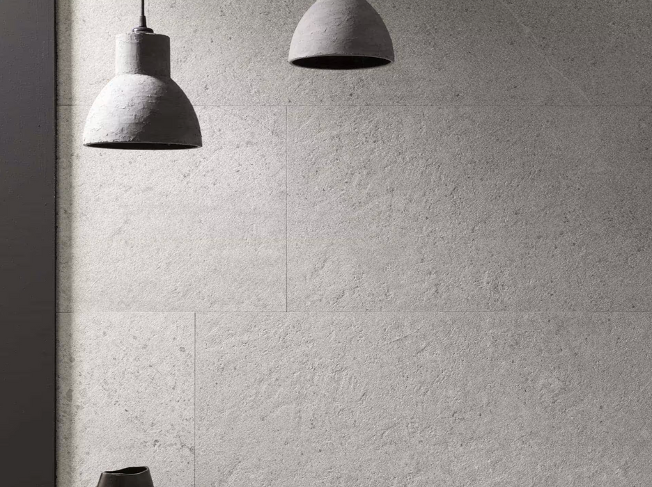 Porcelanosa Prada Acero 45x120cm shown in a styled room setting