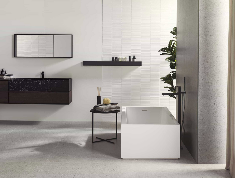 Porcelanosa Prada Acero L 120x120cm shown in a styled room setting