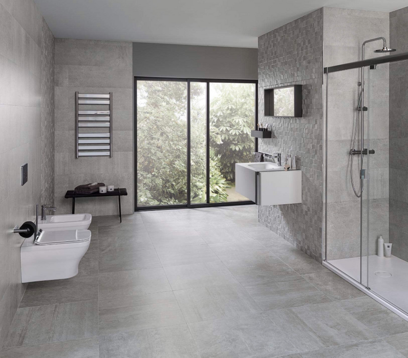 Porcelanosa Rodano Acero 33.299999999999997x100cm shown in a styled room setting