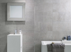Porcelanosa Rodano Acero L 120x120cm shown in a styled room setting