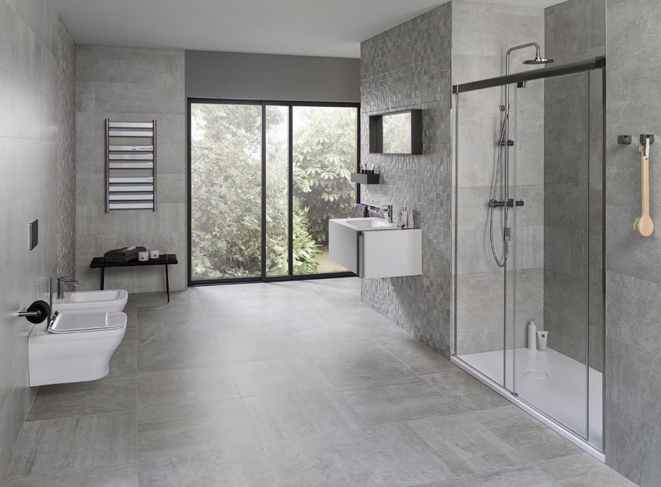 Porcelanosa Rodano Acero L 120x120cm shown in a styled room setting