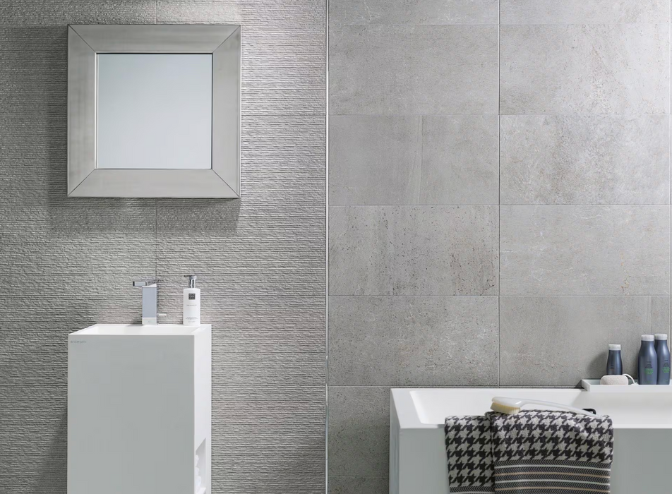 Porcelanosa Rodano Acero L 120x120cm shown in a styled room setting