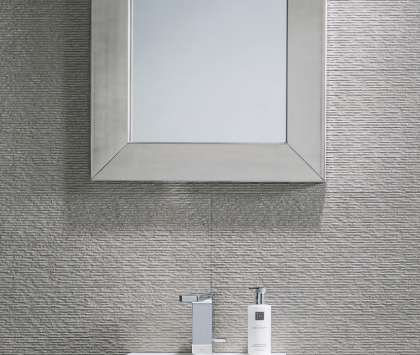 Porcelanosa Rodano Lineal Acero L 33.299999999999997x59.2cm shown in a styled room setting