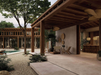 Porcelanosa Savannah Topo L 120x120cm shown in a styled room setting