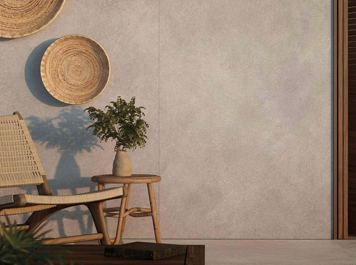 Porcelanosa Savannah Topo L 120x120cm shown in a styled room setting
