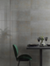 Porcelanosa Shine Aluminio L 33.299999999999997x59.2cm shown in a styled room setting