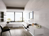 Porcelanosa Shine Platino L 33.299999999999997x59.2cm shown in a styled room setting