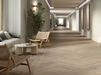 Porcelanosa Smart Tanzania Nut(48c/p) 22x90cm shown in a styled room setting
